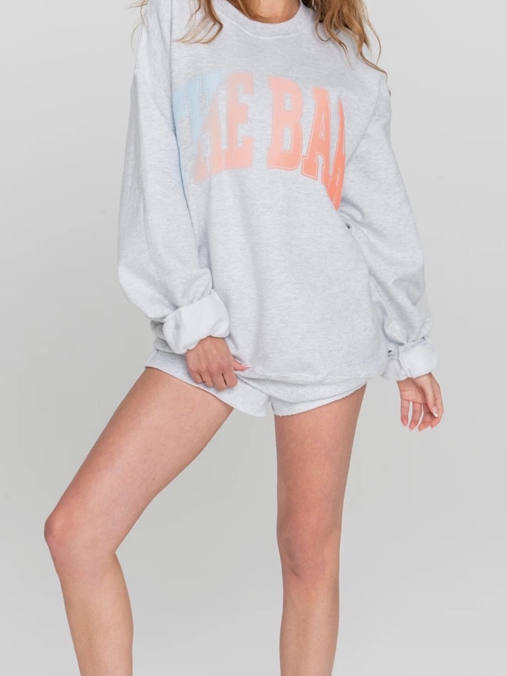 The Bar Light Gray Sweatshirt with Pastel Blue and Peach Logo